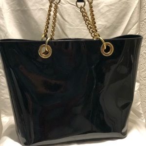 black patten leather bag